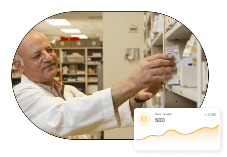 A concept of online medicine selling highlighting a salesperson in a medical store with a sales dashboard in the foreground