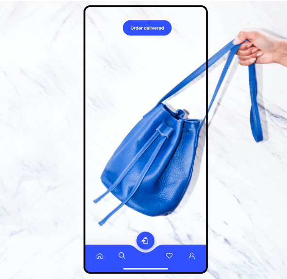 A concept of online selling highlighting a hand holding a bright blue leather bag in a mobile interface